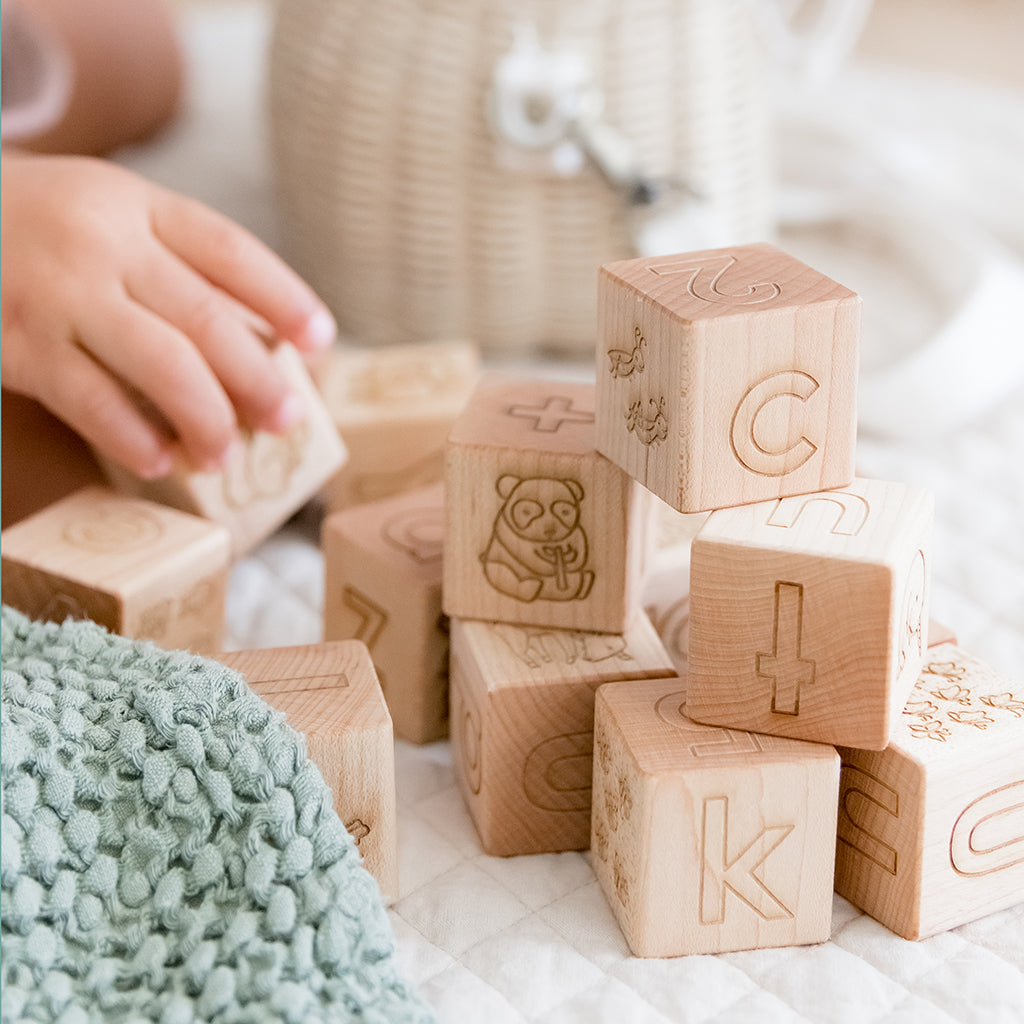hand-drawn animal alphabet blocks global women's fund Smiling Tree Toys